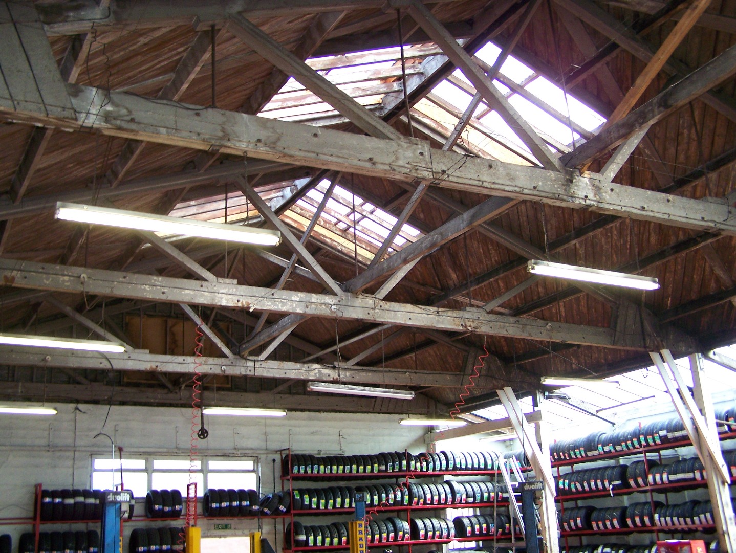 Interior of hangar showing wooden roof trusses 14:07:2006.JPG