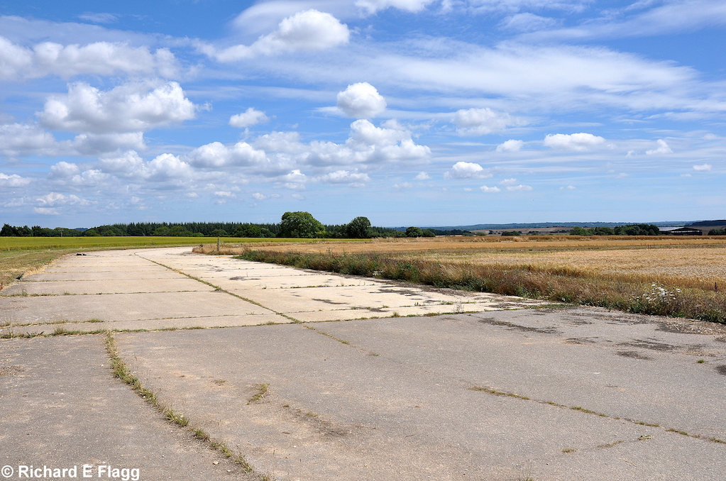 007Taxiway at the north of the airfield. Looking east at the runway 19 threshold - 24 July 2010.png