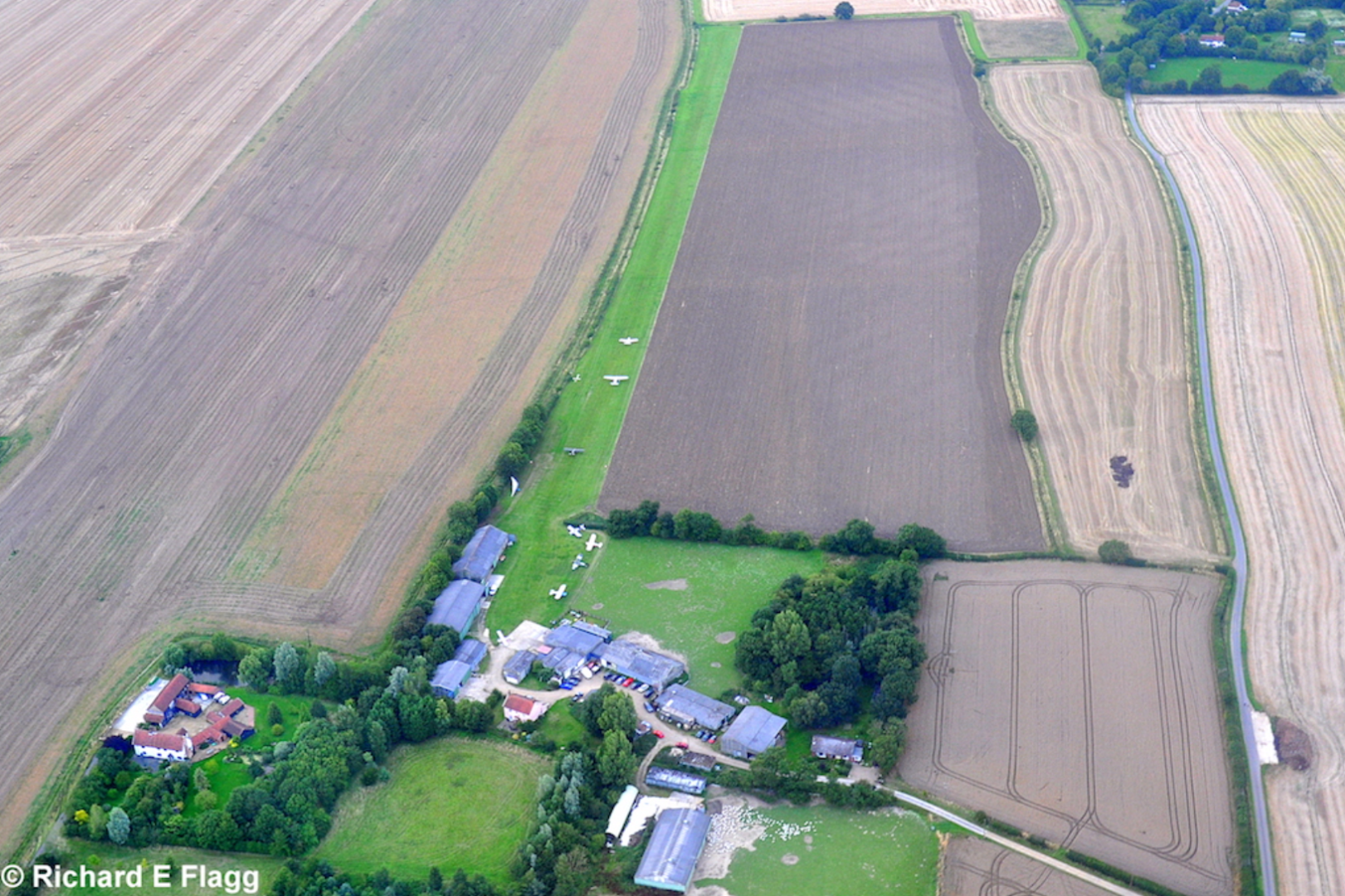 004Aerial view of Priory Farm Airfield - 5 August 2009.png